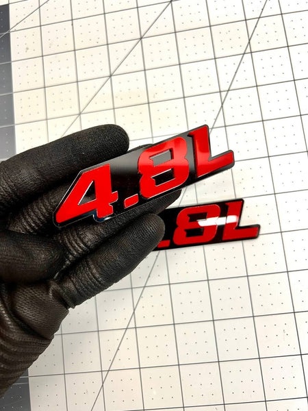 4.8L ENGINE EMBLEMS QTY 2 FENDER EXTERIOR 4.8L ENGINE EMBLEMS BADGE RED PAIR — photo 1